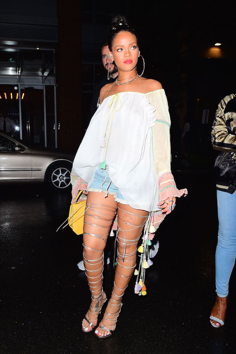 EXCLUSIVE: Rihanna was spotted arriving at 1Oak Nightclub in NYC. She wore a stunning pair of Gold Heels, laced up all the way to her thighs. She wore a bohemian style white blouse with tassels hanging off, and a tiny pair of daisy dukes. She turned heads as she brightened up the dark night. She partied for 2 hours until the club closed at 5am for a private event. Pictured: Rihanna Ref: SPL1293530 310516 EXCLUSIVE Picture by: 247PAPS.TV / Splash News Splash News and Pictures Los Angeles:310-821-2666 New York:212-619-2666 London:870-934-2666 photodesk@splashnews.com 